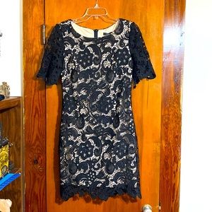 Black and cream colored lace bodycon dress